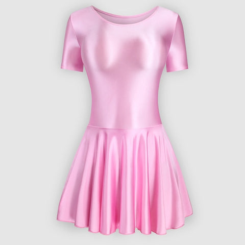 Front view of pink leotard dress featuring a scoop neckline, a scoop back cut, short sleeves, and an attached skirt.