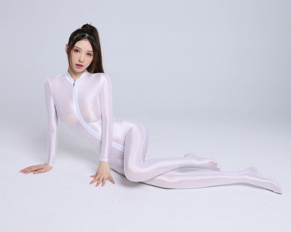 Front view of lady wearing a white color glossy wet look full-body catsuit with front-to-crotch zipper closure, long sleeves, and closed feet.