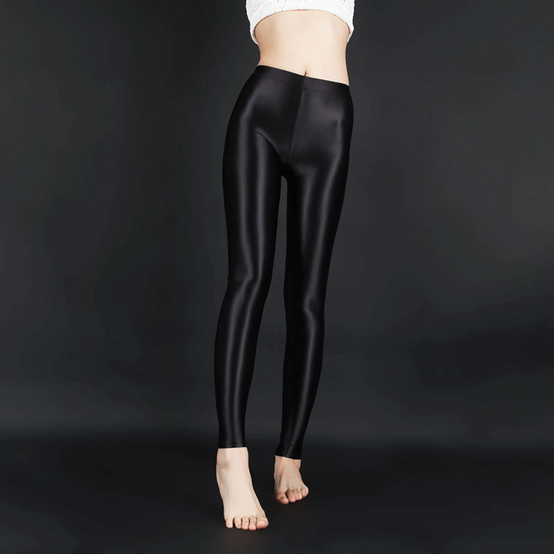 Women in wet outlet look leggings