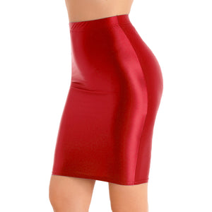 A woman wearing a red glossy skirt with a high waist.