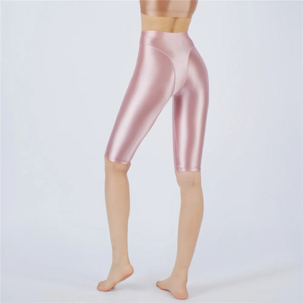 Shiny pink short worn by a person on a white background
