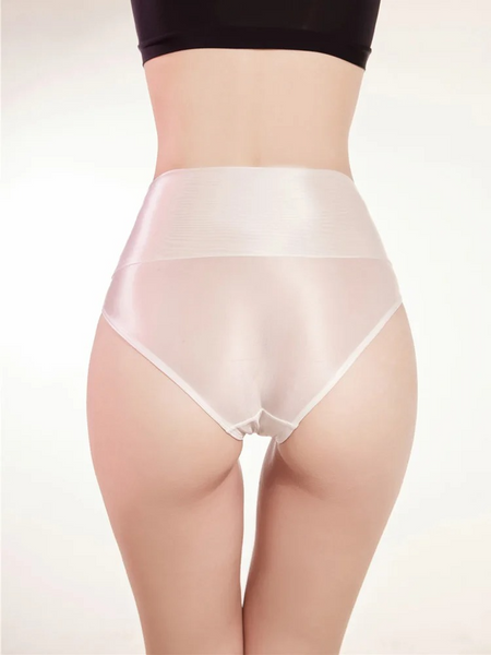 Lady wearing a high waisted white sheer brief.