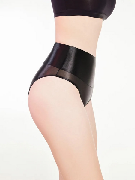 Black sheer thong worn by a person on a white background