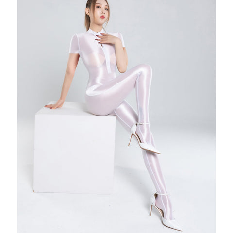 Front view of lady wearing white wet look catsuit that features a high neckline, short sleeves, 2-way bust zipper closure, and a crotch zipper with white high heels.