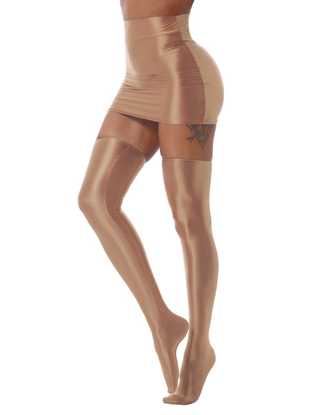 Side view of lady wearing wet look brown mini skirts with matching thigh high stockings.