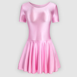 Front view of pink leotard dress featuring a scoop neckline, a scoop back cut, short sleeves, and an attached skirt.