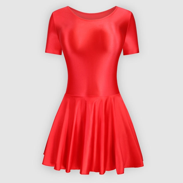 Front view of red leotard dress featuring a scoop neckline, a scoop back cut, short sleeves, and an attached skirt.