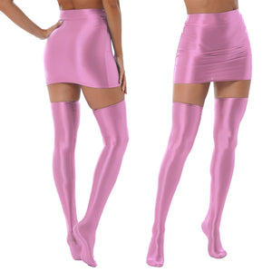 Back and front view of lady wearing wet look pink mini skirts with matching thigh high stockings.