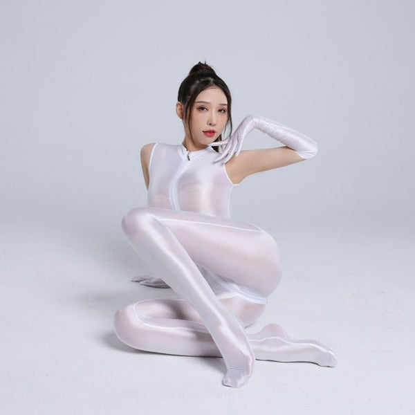 Front view of lady wearing white wet look catsuit featuring a front to crotch zipper closure, matching gloves and a seductive shiny fabric.