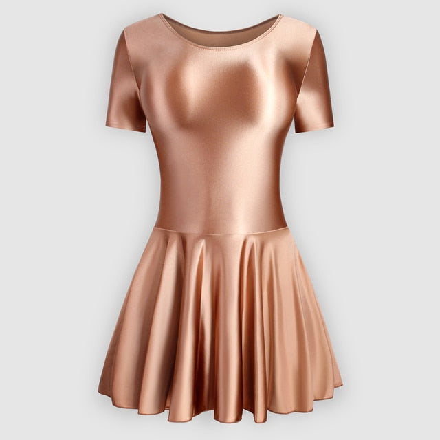 Front view of brown leotard dress featuring a scoop neckline, a scoop back cut, short sleeves, and an attached skirt.