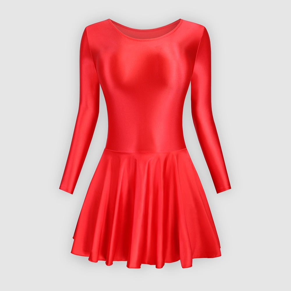 Front view of red leotard dress featuring a scoop neckline, a scoop back cut, long sleeves, and an attached skirt.