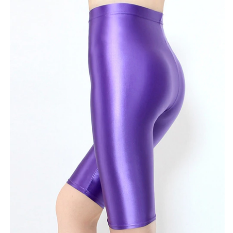 back view of lady wearing purple shiny wet look running shorts