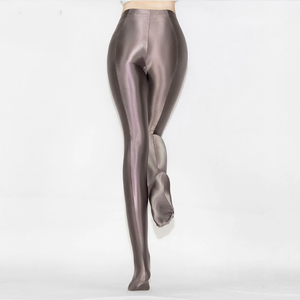 back view of lady wearing taupe shiny wet look opaque pantyhose