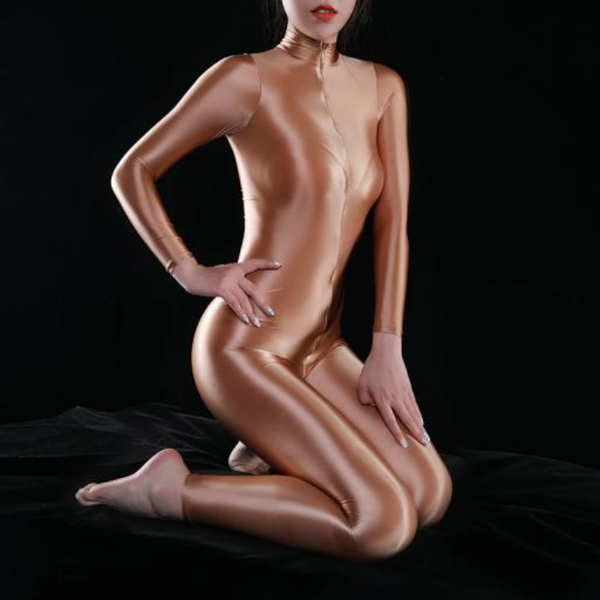 front view of lady wearing brown turtle neck wet look shiny long sleeves catsuit with front to back zipper closure showing off her feet