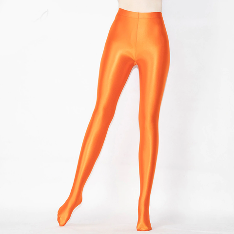 front view of lady wearing orange shiny wet look opaque pantyhose