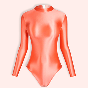 front view of scarlet color leotard featuring long sleeves, back zipper closure, enticing shiny wet look fabric and a cheeky cut back.