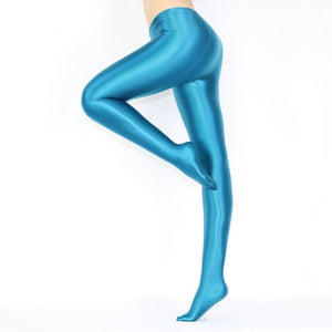 side view of lady wearing sapphire shiny wet look opaque pantyhose