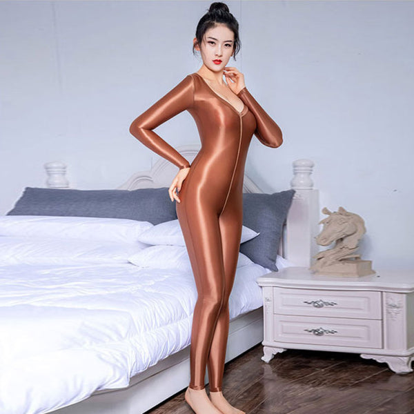 front view of lady wearing brown wet look shiny catsuit featuring scoop neckline, long sleeves and front to back zipper closure