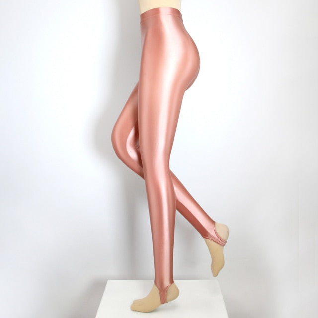 Side of pink color shiny wet look stirrup legging.