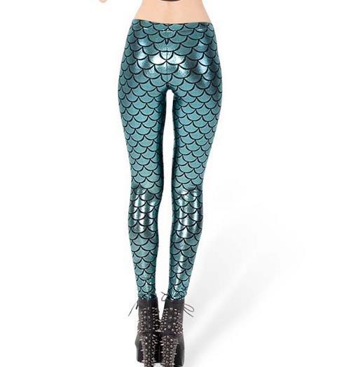 Back view of lady wearing shiny baby blue legging with shimmering fish scale print.
