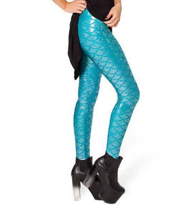 Side view of lady wearing shiny sky blue legging with shimmering fish scale print.