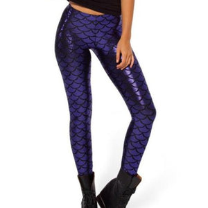 Front view of lady wearing violet shiny legging with shimmering fish scale print.