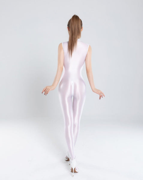 Back view of lady wearing white glossy catsuit with front bust to neck zipper closure, and crotch zipper closure wearing white high heels.