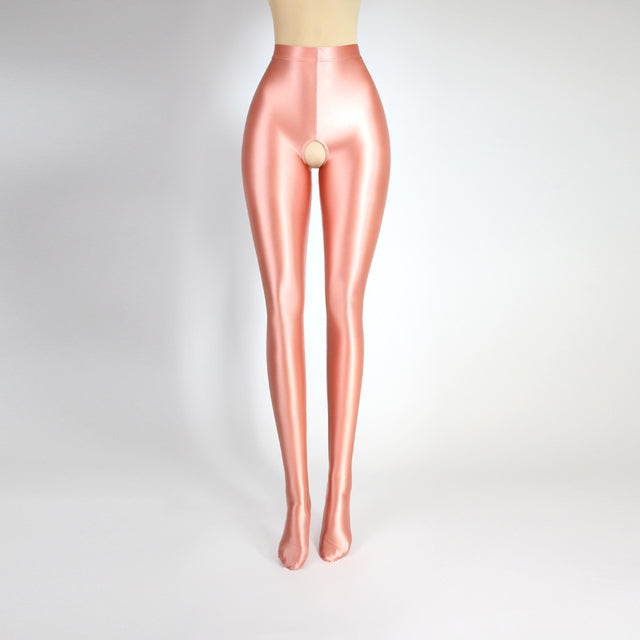 Front view of coral color glossy crotchless tights.