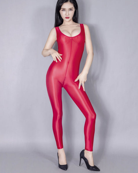 Front view of lady wearing sheer red shiny catsuit featuring a scoop neckline, thick shoulder straps for all-day comfort, and a zipper crotch with black high heels.