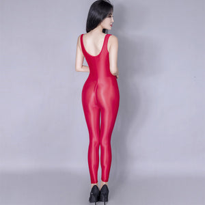 Back view of lady wearing sheer red shiny catsuit featuring a scoop neckline, thick shoulder straps for all-day comfort, and a zipper crotch with black high heels.