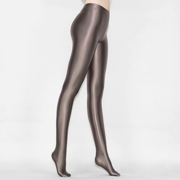 side view of lady wearing taupe shiny wet look opaque pantyhose